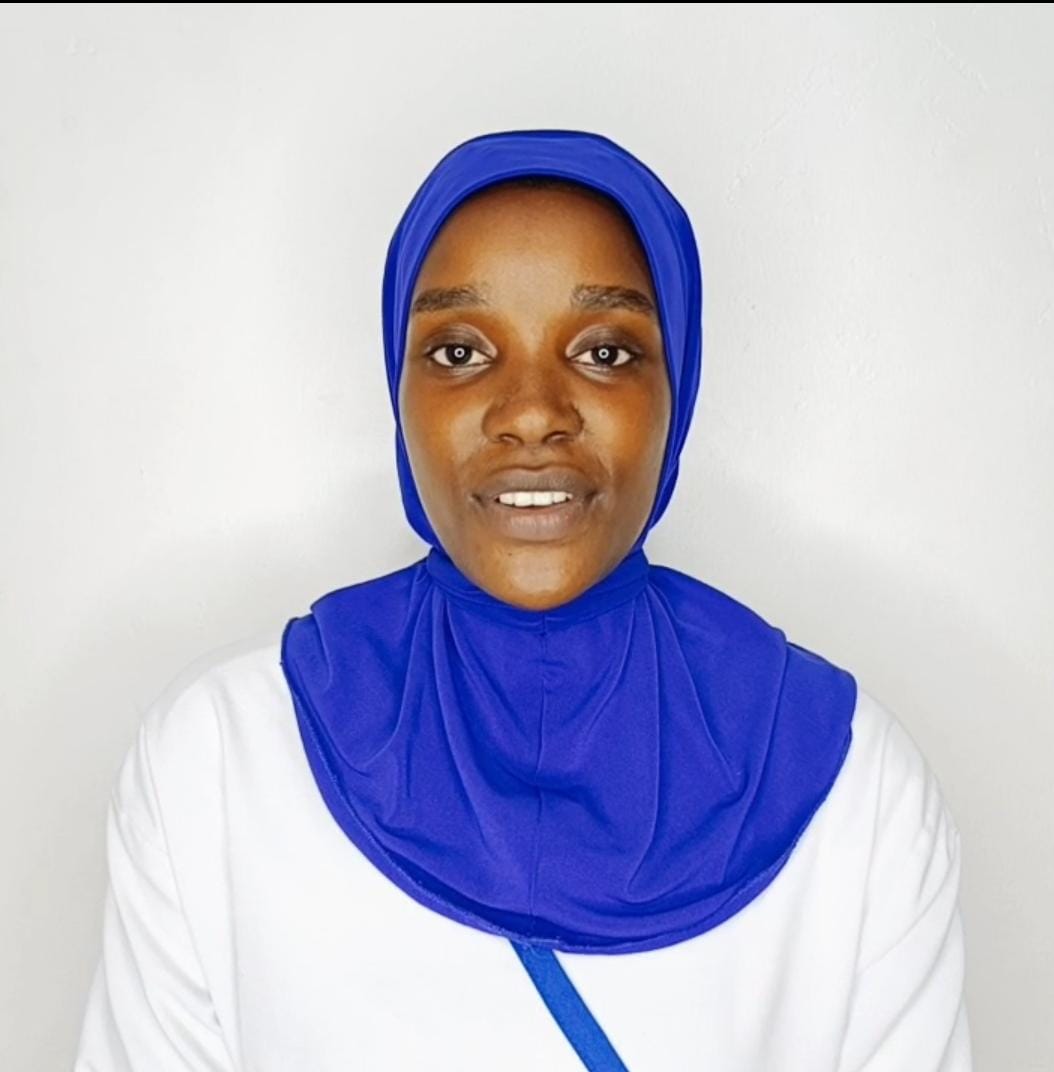 JOAN  AINEMBABAZI