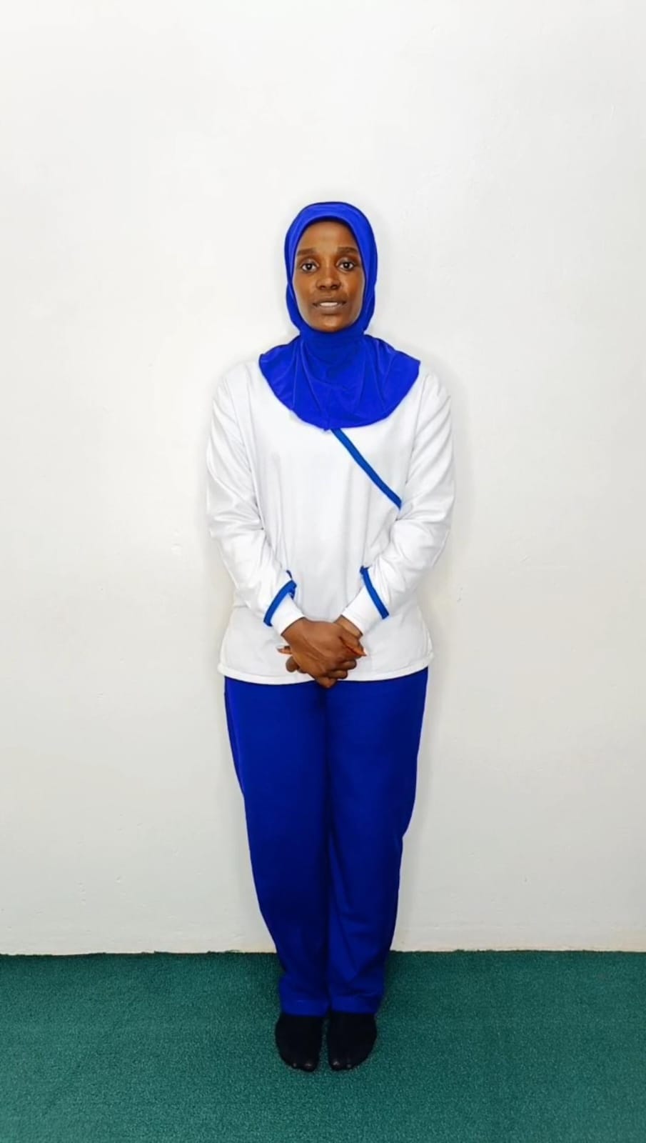 JOAN  AINEMBABAZI